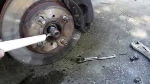how to remove cv axle from transmission